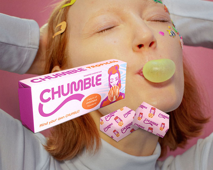 Chewing Gum packaging design Tropical by Loredana Codau. Behind the package and two gums there is the photo of a happy girl chewing and making a balloon