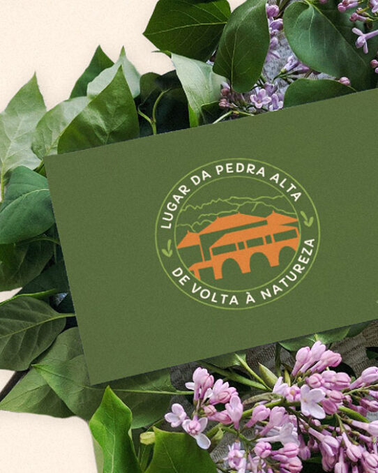 Lugar da Pedra Alta card mockup between lilac flowers