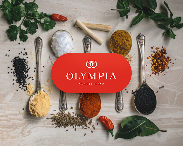 Rebranding Olympia mockup primary logo - behind the logo there are spoons with condiments, peppers and basil leaves -passion project by ©Loredana Codau