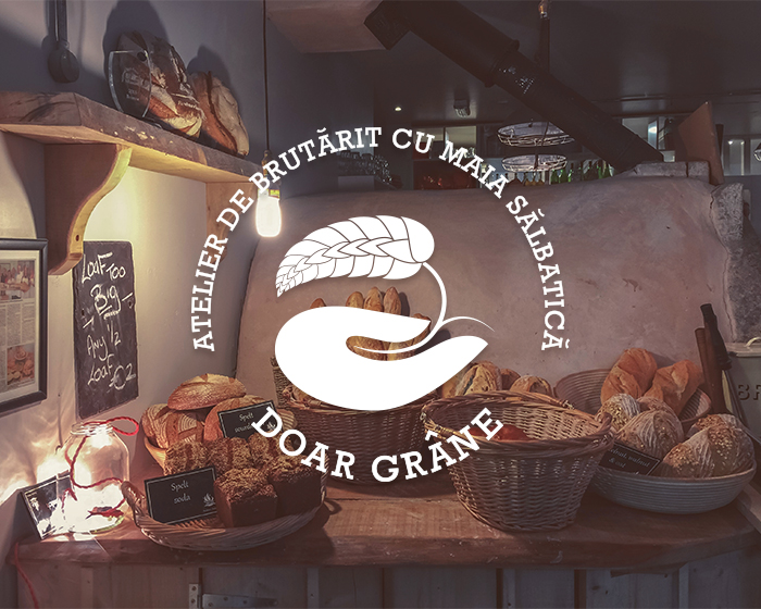 Primary logo Doar grâne (Only grains) on top of a photo of a bakery