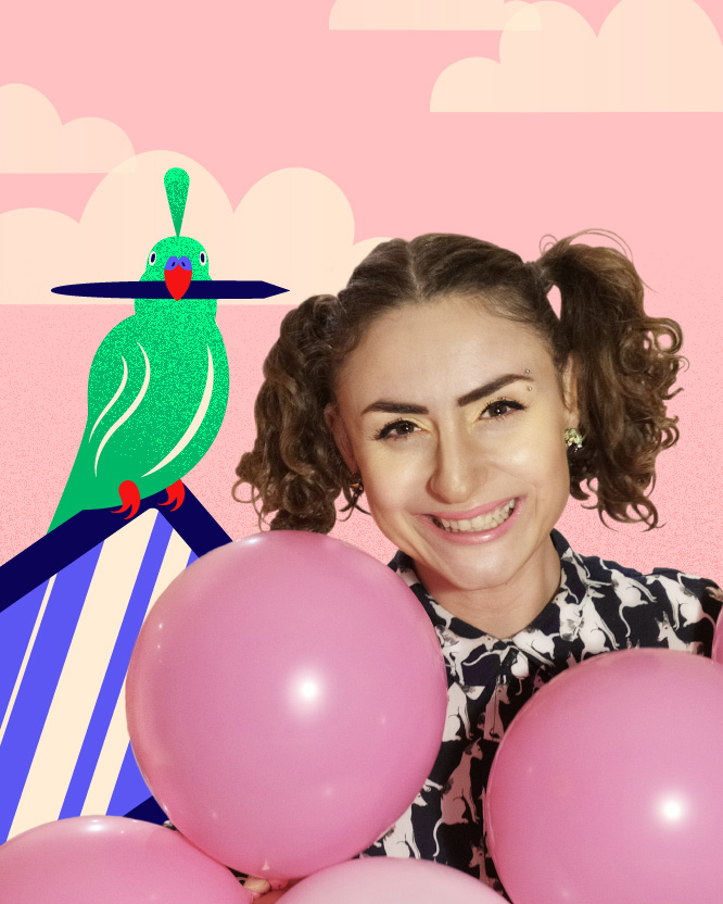 Loredana Codau with balloons in her hands. Behind here there is a graphic tablet on which there is a parrot holding a stylus in its beak