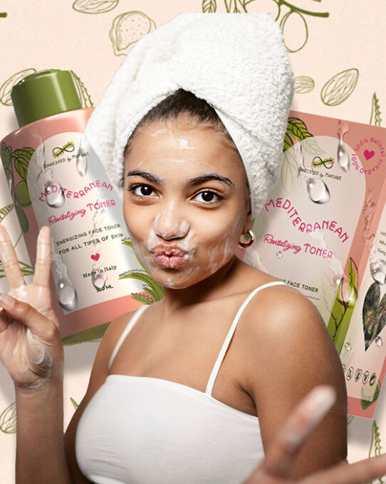 A young girl wearing a towel on her head is showing the victory sign. Behind her there is presented the packaging design for Mediterranean Revitalizing Toner, with water droplets on it.